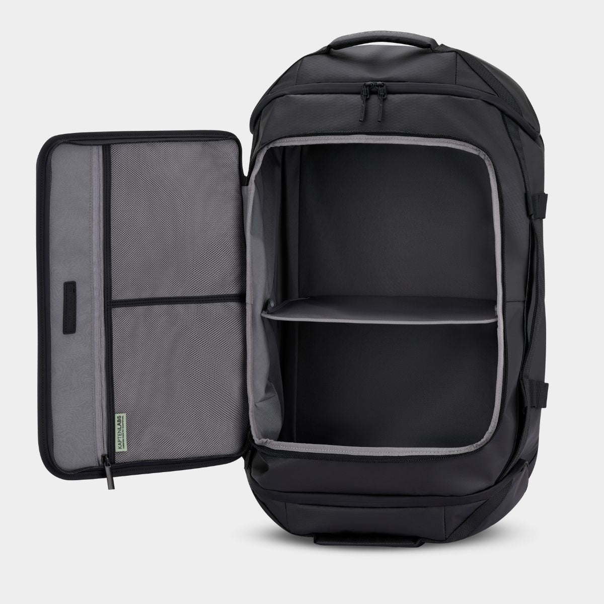 Black backpack duffle bag with open compartment on a  light gray background