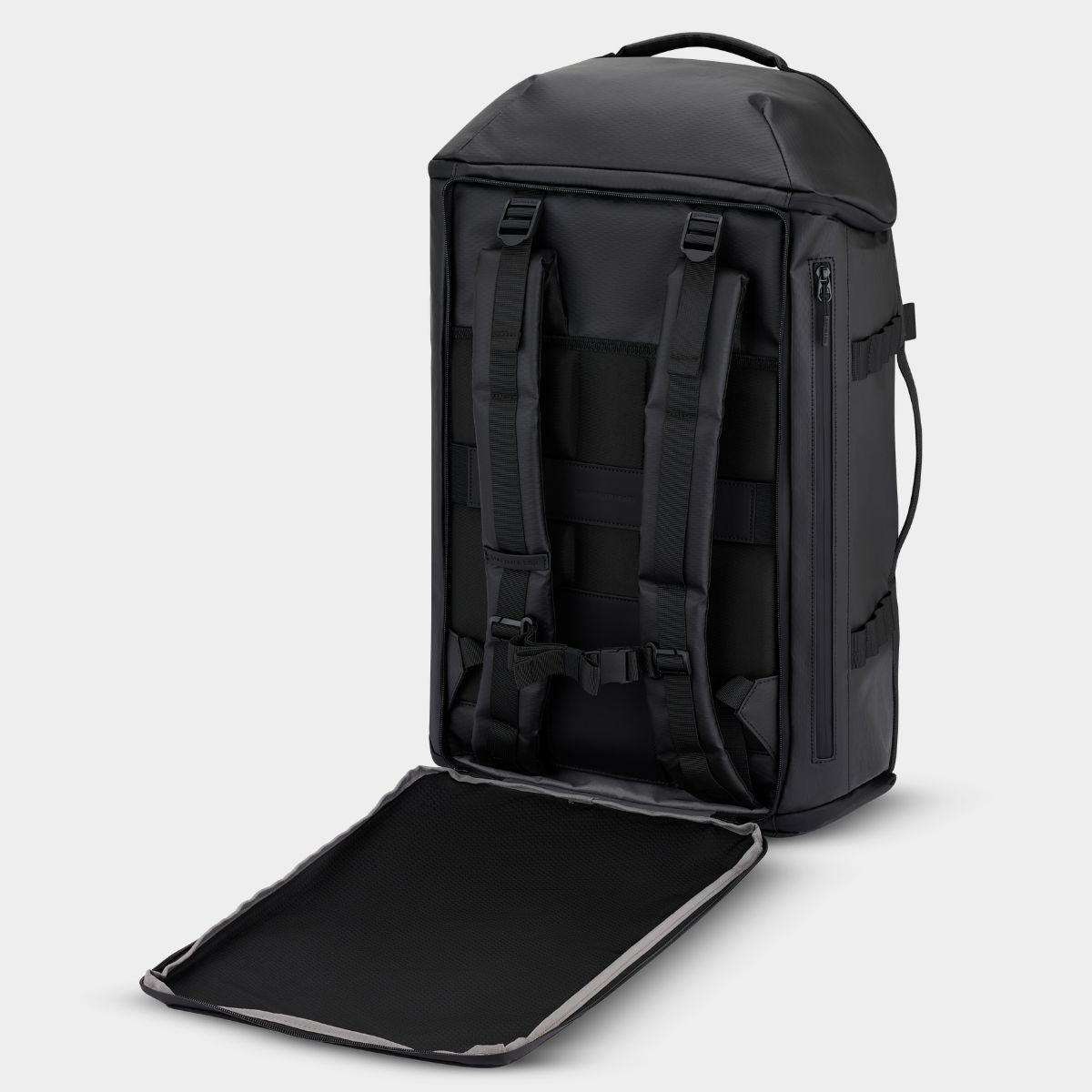 Black travel duffle backpack with a convertible roll away cover on a light gray  background