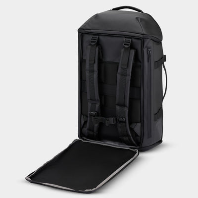 Black travel duffle backpack with a convertible roll away cover on a light gray  background