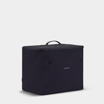 Black soft sides container against. light gray background with "KAPTEN & SON" logo written in white. Zipper closure with a top handle.