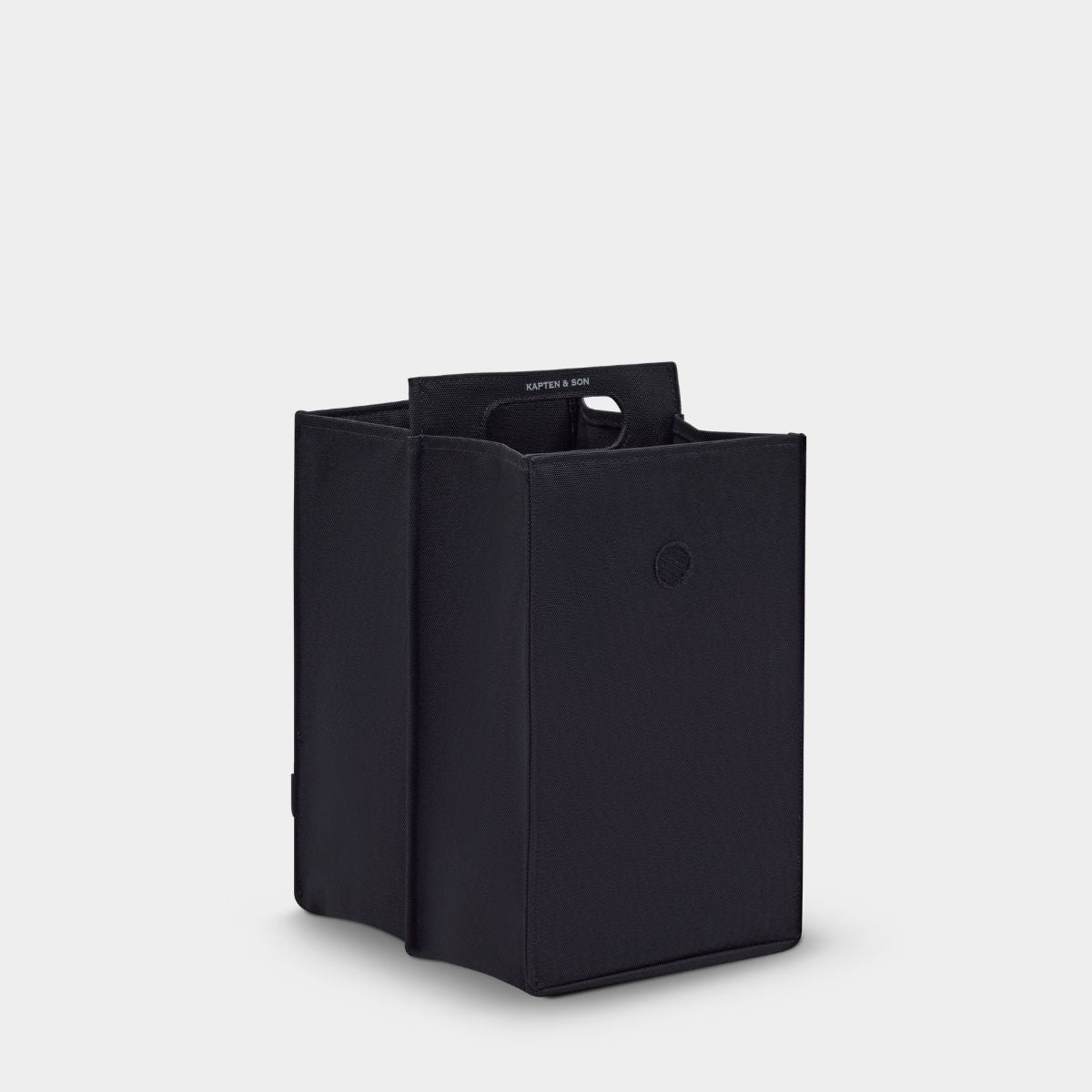 Black rectangular box with a handle on a white background
