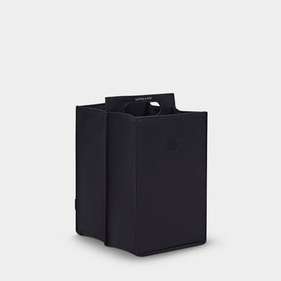 Black rectangular box with a handle on a white background